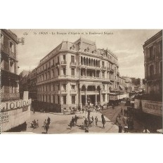 CPA: ALGERIE, ANNEES 1910. ORAN, LA BANQUE D'ALGERIE ET LE BOULEVARD SEGUIN.