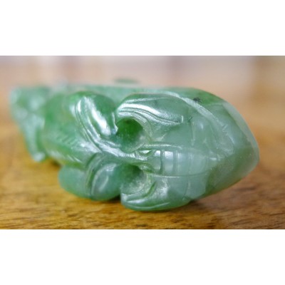 CHINE, FIBULE EN JADE SCULPTE. CHINA, FIBULA in CARVED JADE.