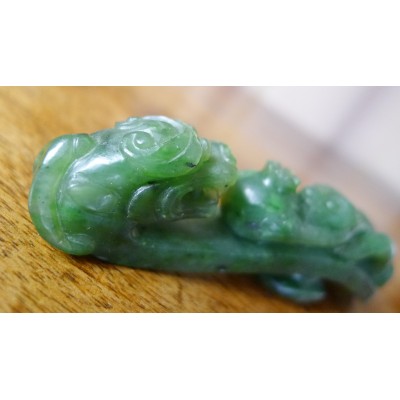 CHINE, FIBULE EN JADE SCULPTE. CHINA, FIBULA in CARVED JADE.