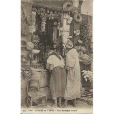 *CPA MAROC, ANNEES 1910, SCENES ET TYPES, UNE BOUTIQUE ARABE.